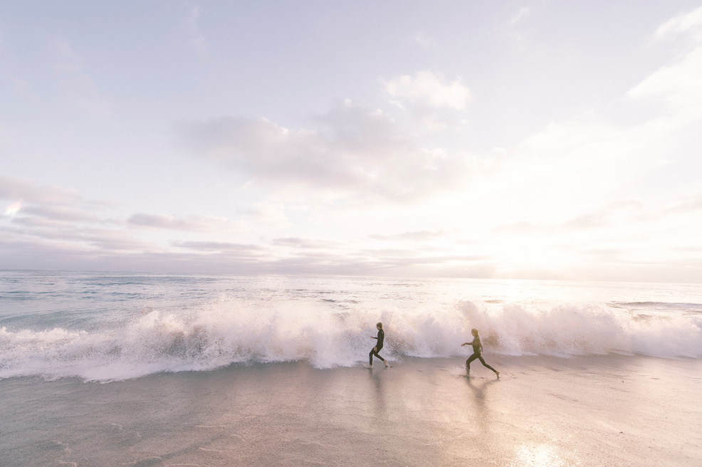 Surfers Enjoying theWaves